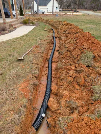 New drain field trench for a septic system in Alamance County, NC
