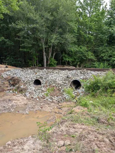 Drainage pipe installed under a driveway in Alamance County, NC